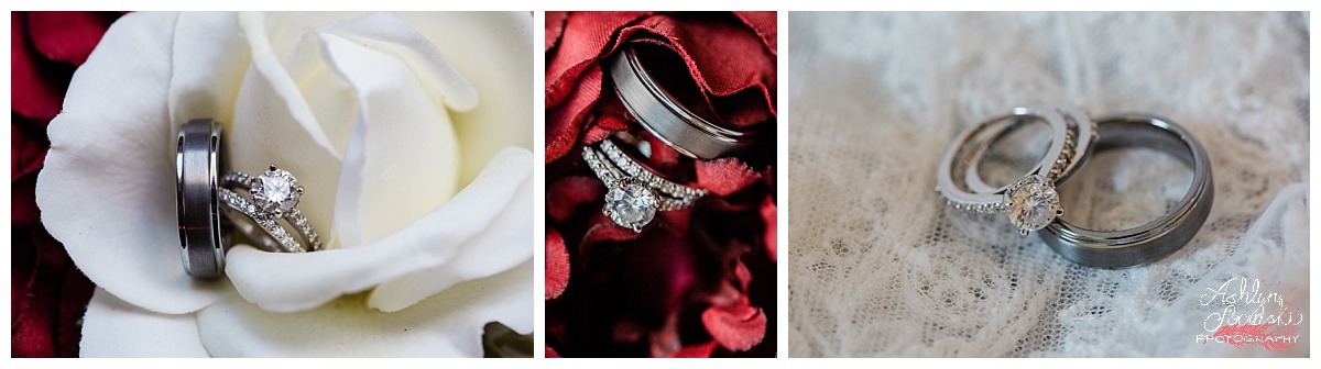 ring detail photos, with the rings sitting on red and white roses. Ring sitting on lace of the wedding gown