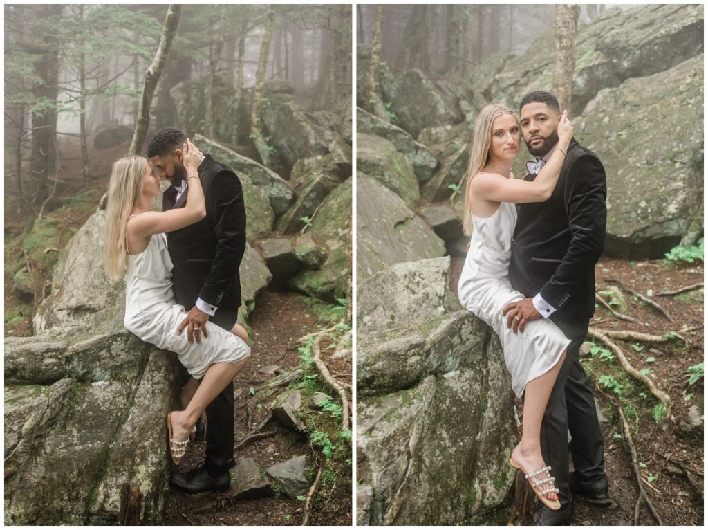 couple hugging on rock in roan mountain