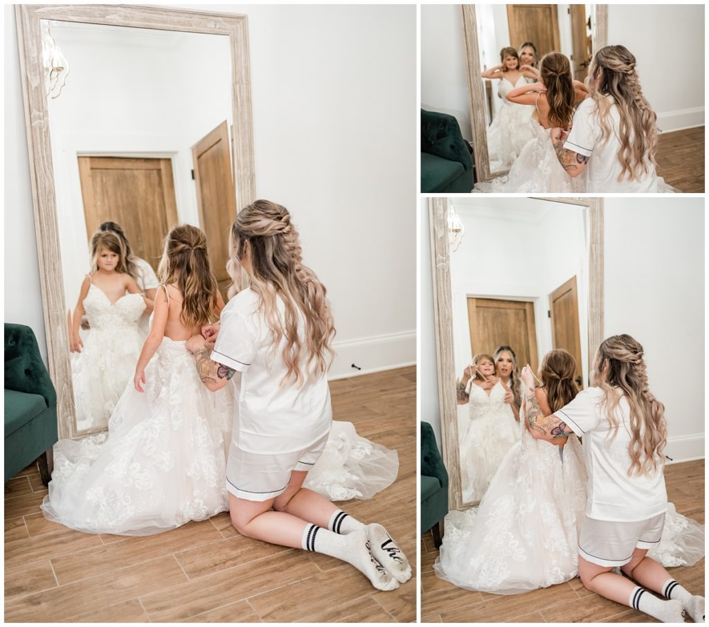 bride and daughter getting ready in bride's wedding dress