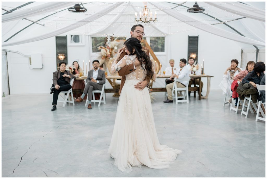 bride and groom first dance at reception