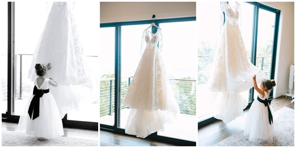 a bride's daughter admiring her wedding dress