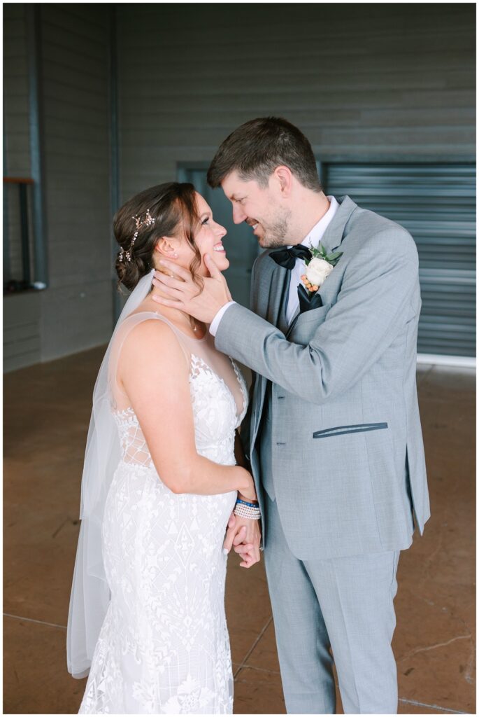 bride and groom portrait outside the grooms suite at the trillium venue