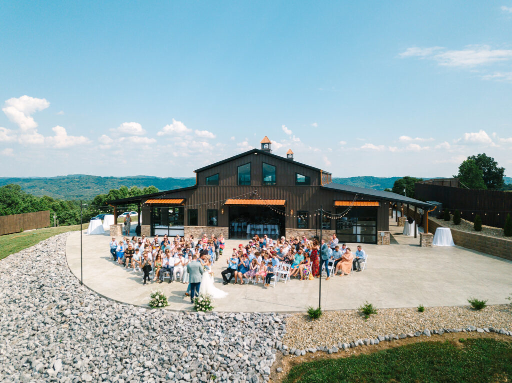 newlywed first kiss drone photo at the loyston venue