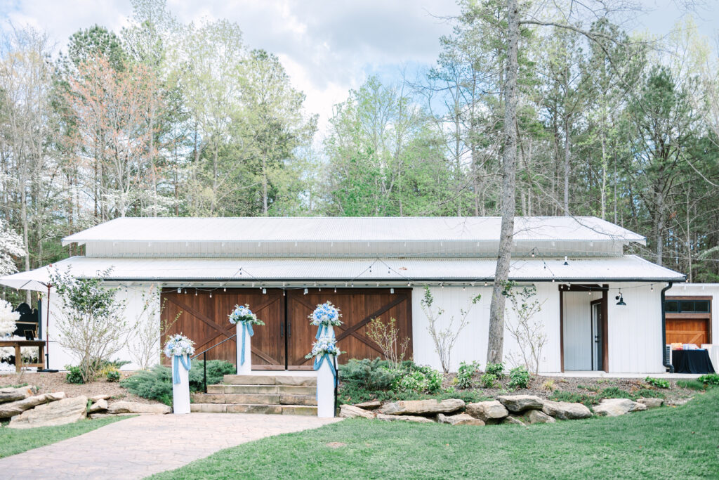 Hidden Springs Venue set up for wedding in april with blue and white florals
