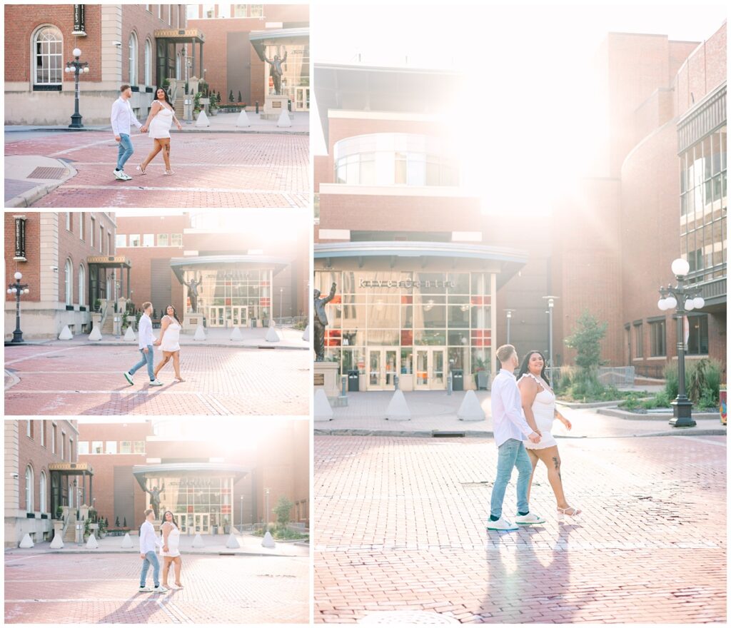 a couple walking across the street in downtown st. paul, minnesota