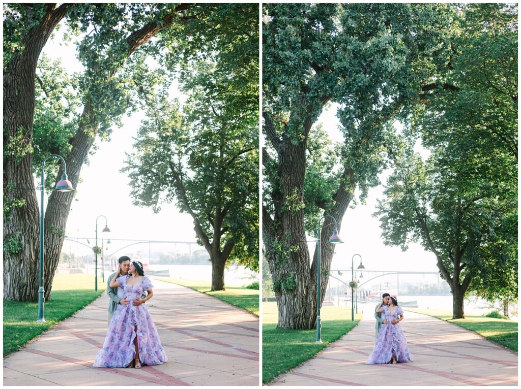 couple standing in a path of eastern cottonwood trees