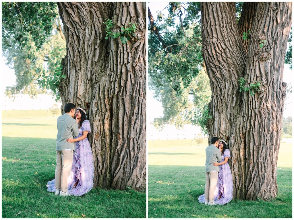 minnesota engaged couple leaning against eastern cottonwood tree in st. paul