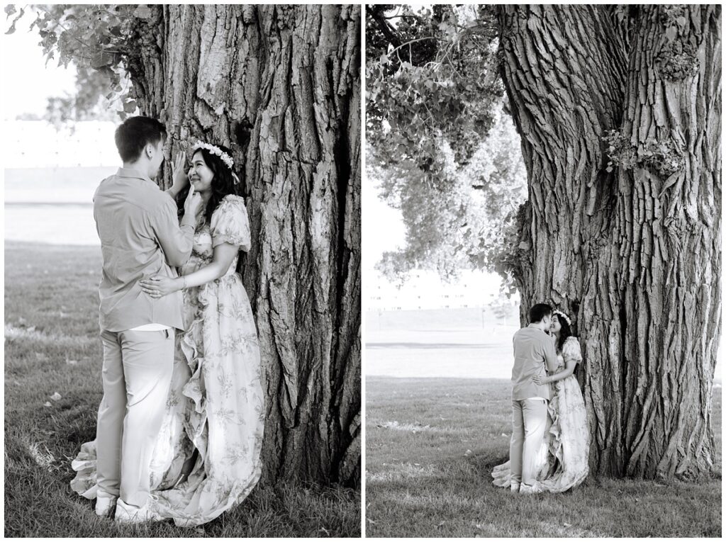 minnesota engaged couple leaning against eastern cottonwood tree in st. paul