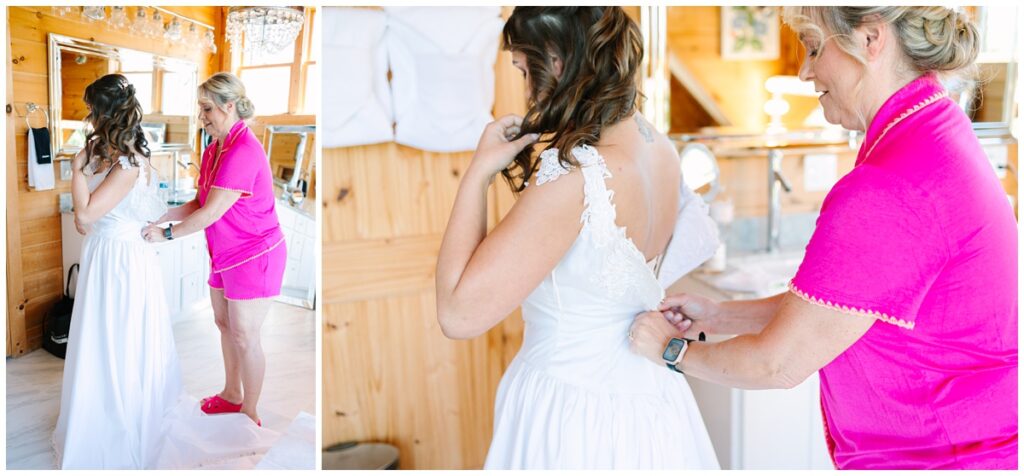 mother zipping bride's dress