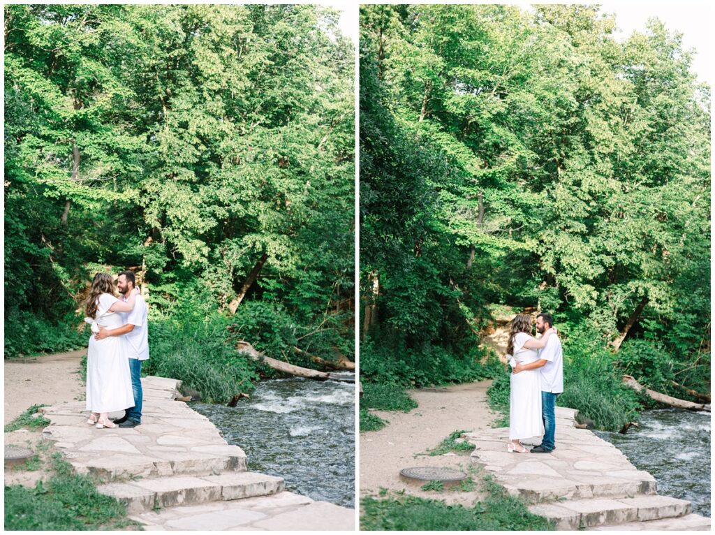 couple slow dancing together in front of a river in minnesota