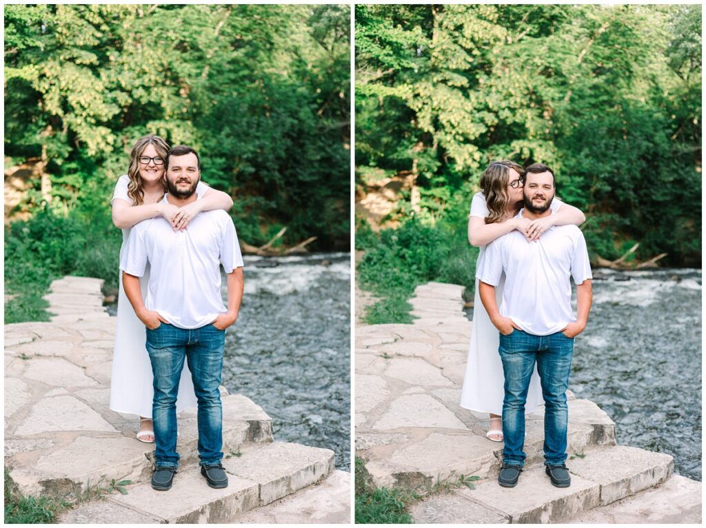 couple standing together in front of minnehaha falls river