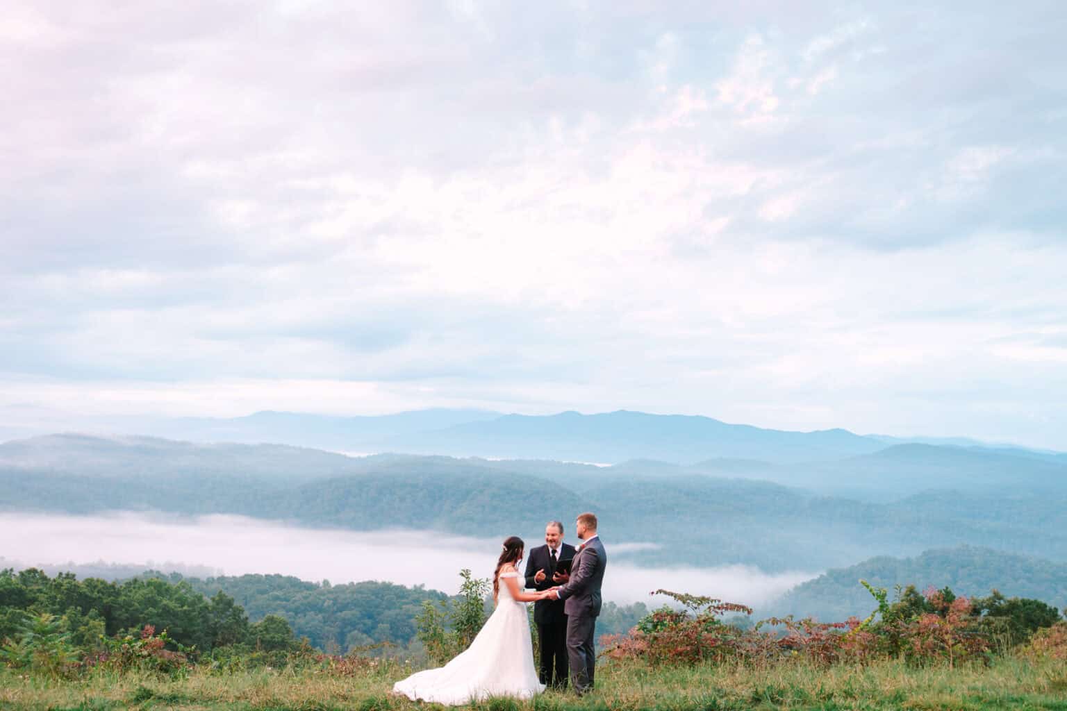Small sunrise wedding ceremony overlooking the Smoky Mountains from Foothills Parkway