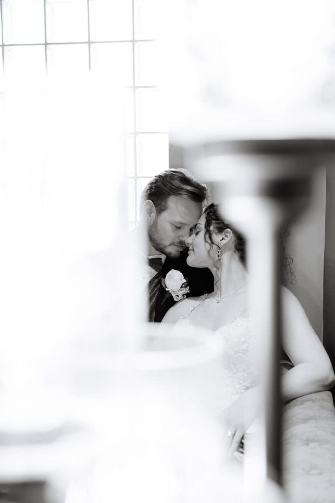 Olivia + Andrew Wedding Soft black and white portrait of the bride and groom embracing