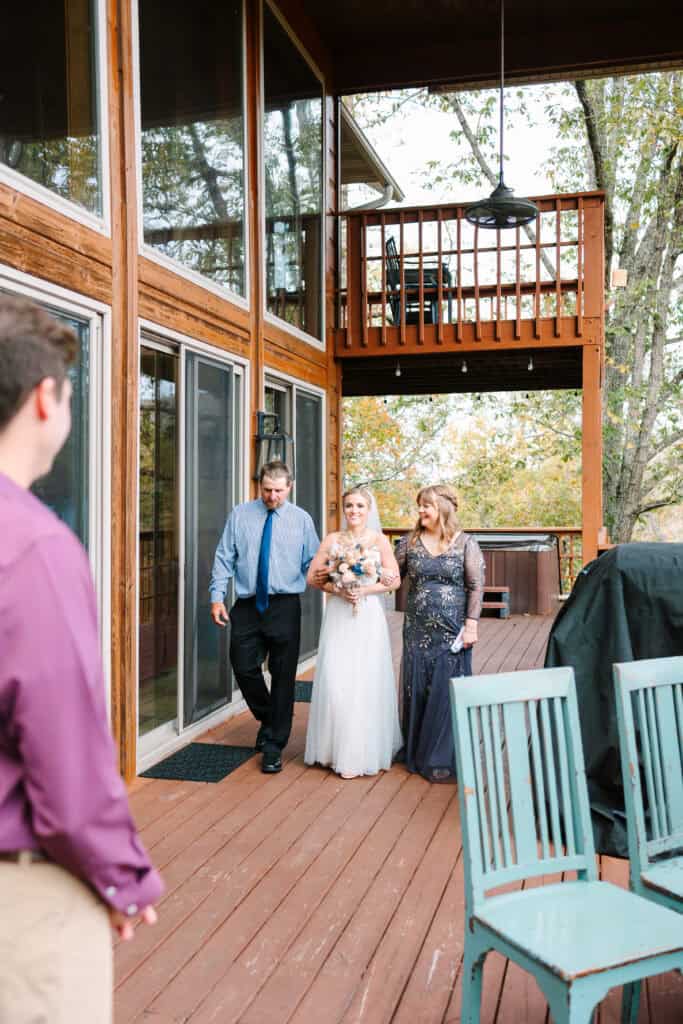 Bride walking to the cabin deck ceremony with her family