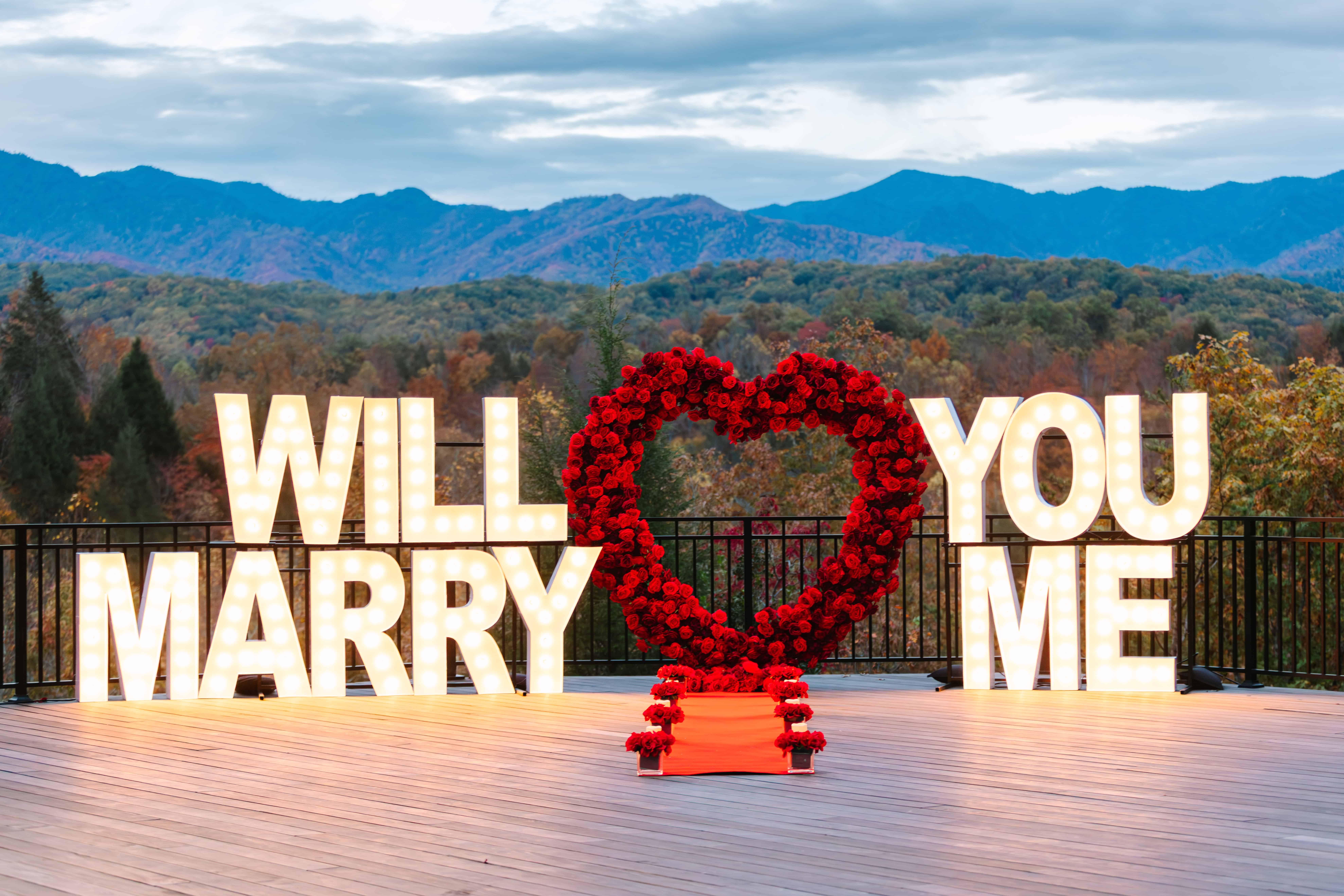 Red rose heart proposal setup overlooking the Smoky Mountains in fall