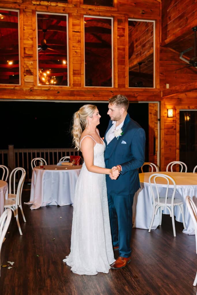 Lauren + Connor Wedding Bride and groom share their first dance inside the reception