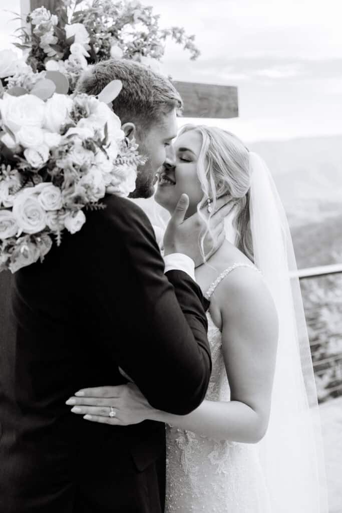 Lauren + Connor Wedding Black-and-white close-up of the bride and groom sharing a quiet embrace