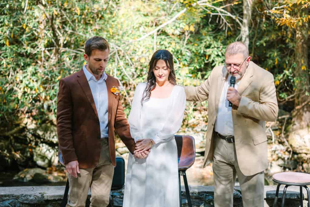 Thaís + Nick Wedding Officiant speaking during the Elkmont wedding ceremony