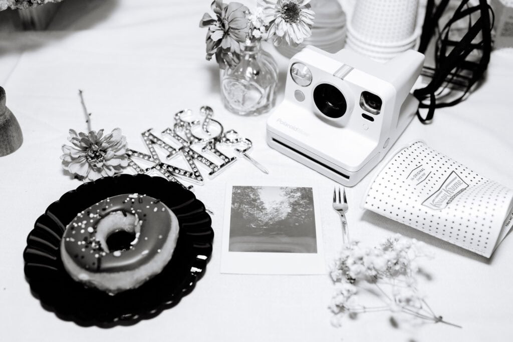 Thaís + Nick Wedding Black and white photo of guest book and keepsake details