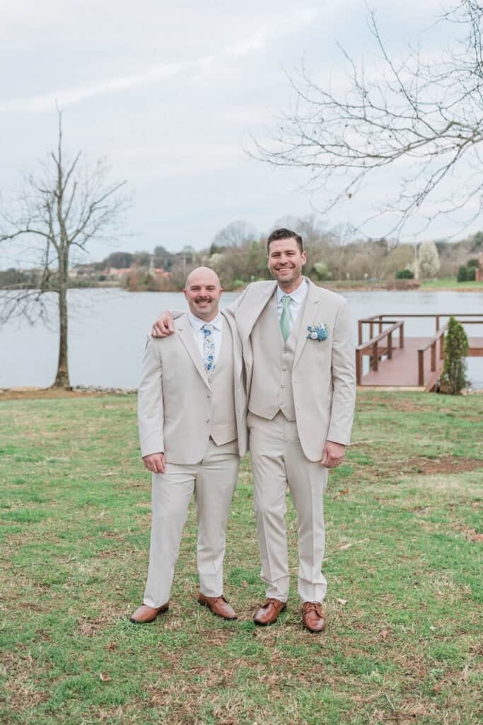 Sarah + Jake Wedding Groom smiling with two groomsmen