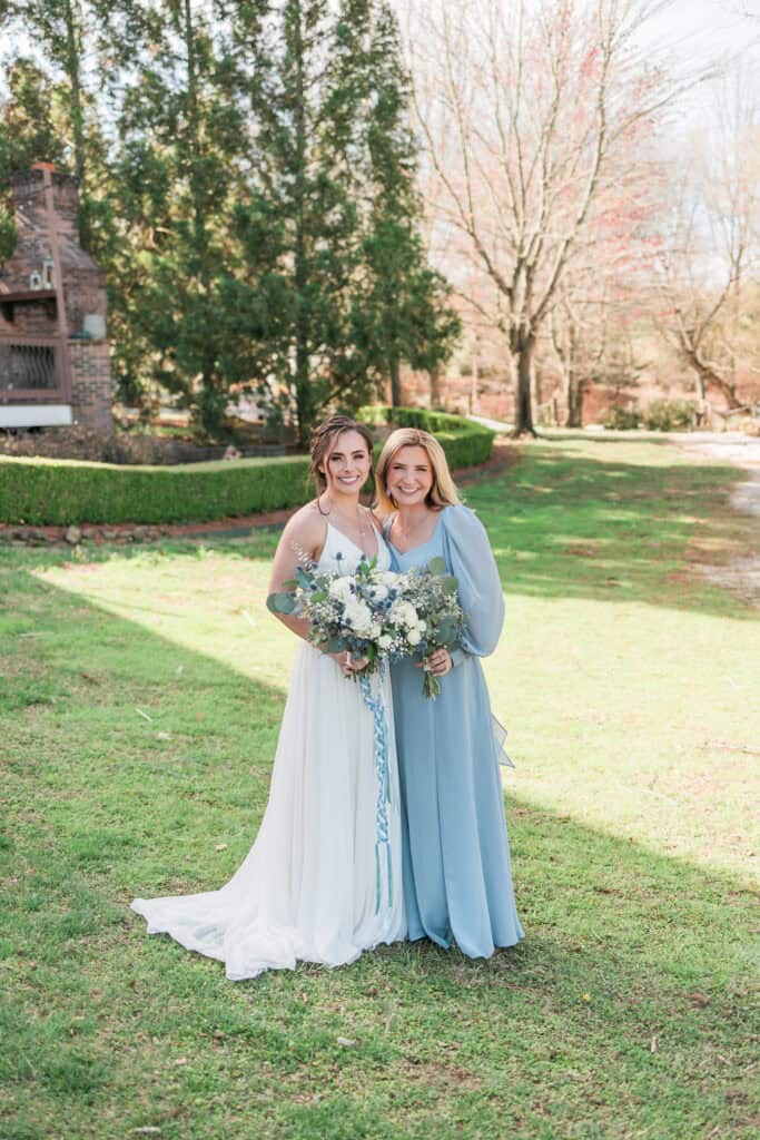 Sarah + Jake Wedding Bride and bridesmaid holding bouquets