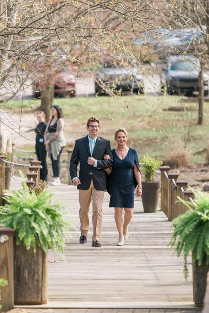 Sarah + Jake Wedding Guests heading down to the ceremony site