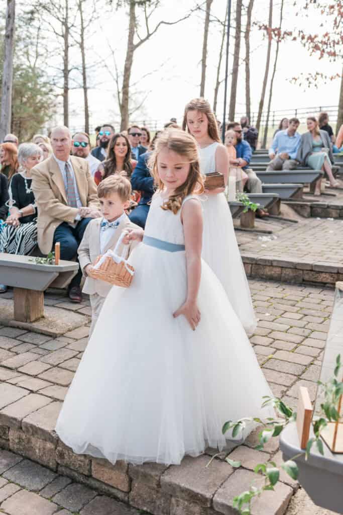 Sarah + Jake Wedding Flower girls smiling during the processional