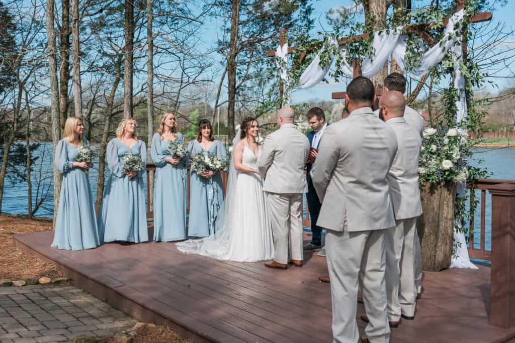Sarah + Jake Wedding Wide view of the wedding party on the deck