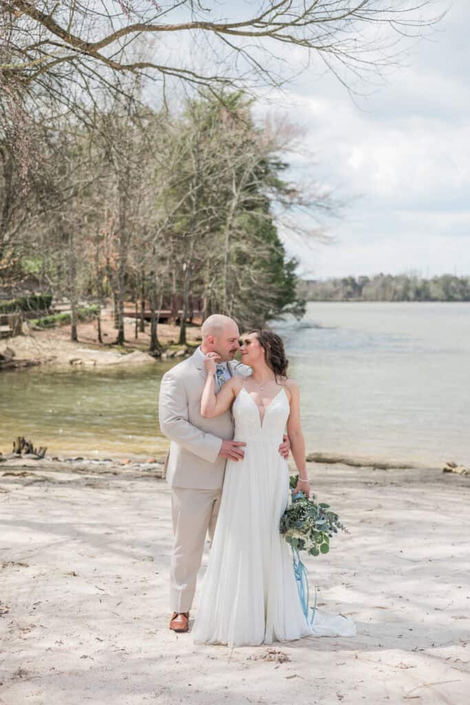 Sarah + Jake Wedding Couple on the private beach at Hunter Valley Farm